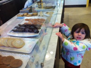 My daughter desperately requesting her second madeleine. 