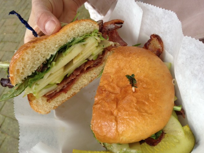 The ABC: cheddar cheese, granny smith apple, bacon and greens on a soft roll.