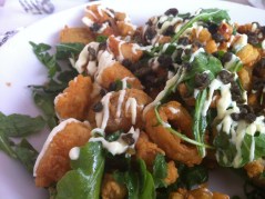 Point Judith Calamari: Lightly fried calamari with cherry peppers, tossed with arugula and fried capers, and topped with citrus aioli