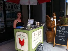 The ice cream cart is parked outside of Ellie's Bakery most days from noon til 5 pm.