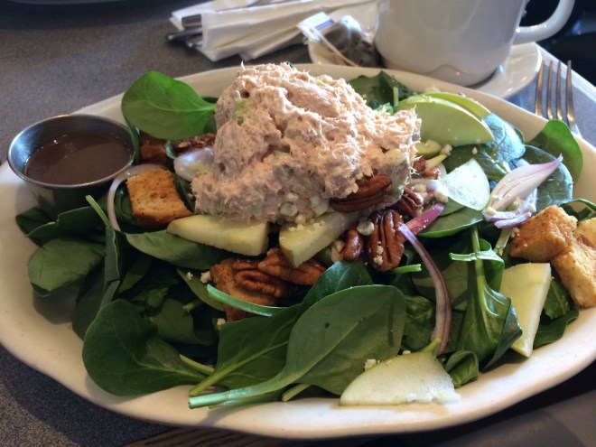 Spinach salad with apples, pecans, gorgonzola and balsamic dressing. 