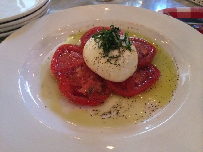The traditional caprese salad is made even better at Roslina with burrata cheese.